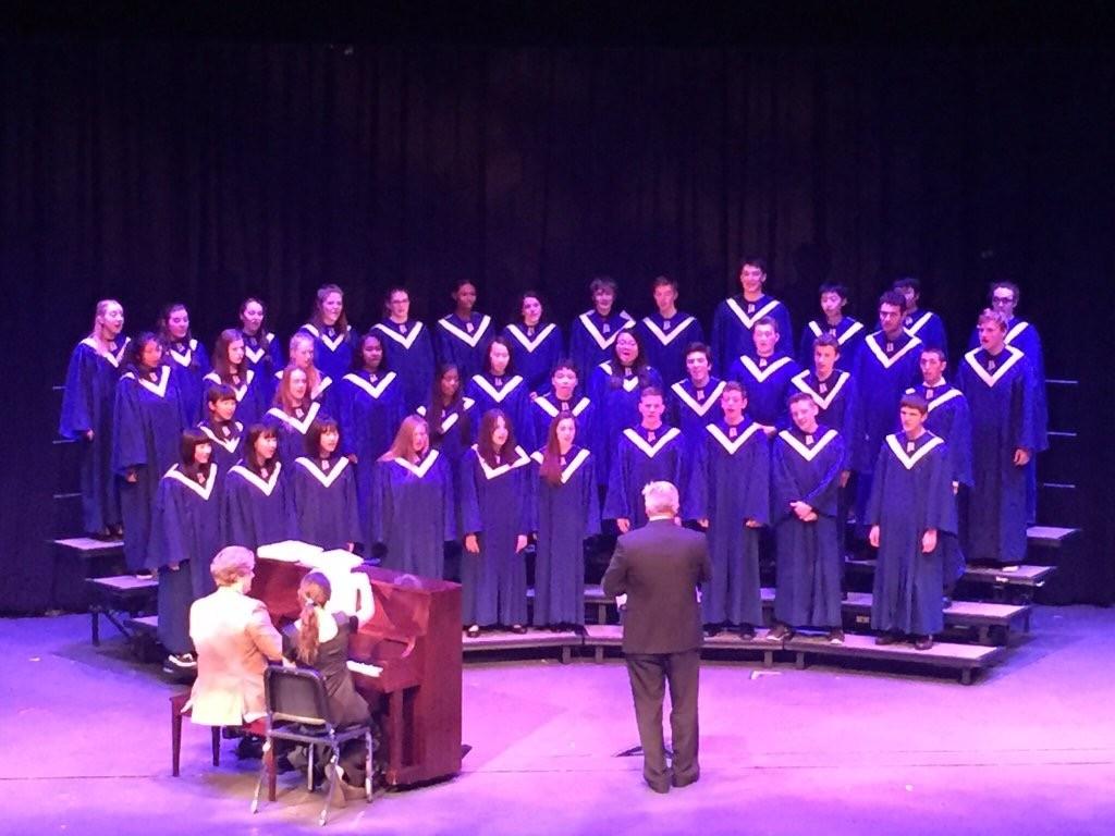 Frank Lewis directs the concert choir at the spring choral performance. Photo courtesy of Bellarmine Prep Twitter