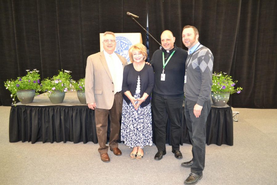Jim Fish, Judy Torgerson, Fr. Tom Lamanna, S.J. and Erik Michels will be leaving at the end of the year. Not pictured: Kirsten Byers, Julie Campbell, Denise Diaz and Frank Lewis. Photo by Jeanne Hanigan