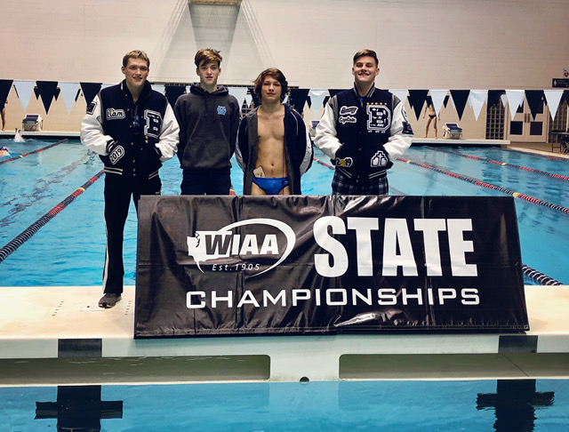 Although they compete for other schools, these four swimmers represent Bellarmine well. From left: Liam Casey-Minnick B19, Billy Oates B22, Valen Holmes B21, Connor Hodges B19. Photo courtesy of Kelli Hodges