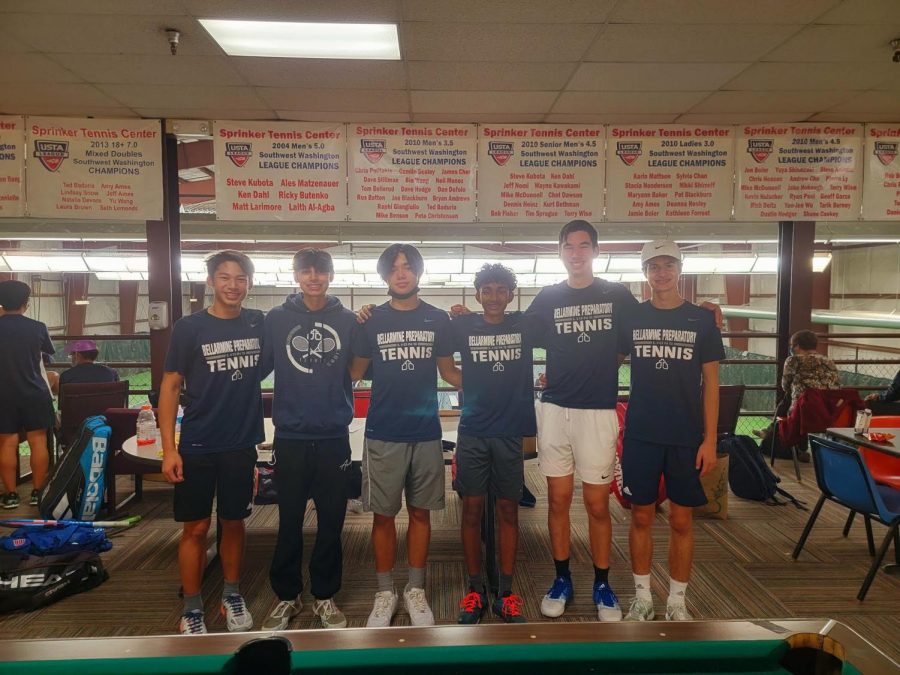 The boys tennis team pose after finishing first in Leagues.