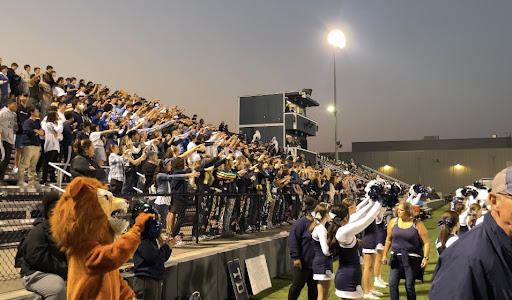 The Bellarmine student section cheers on the Lions vs. South Kitsap.