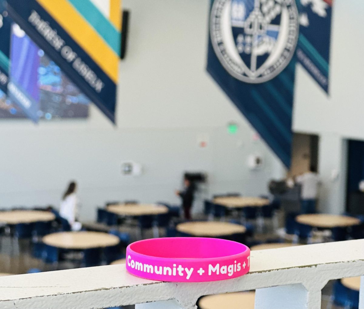 Some faculty/staff members are sporting these pink bands around campus.