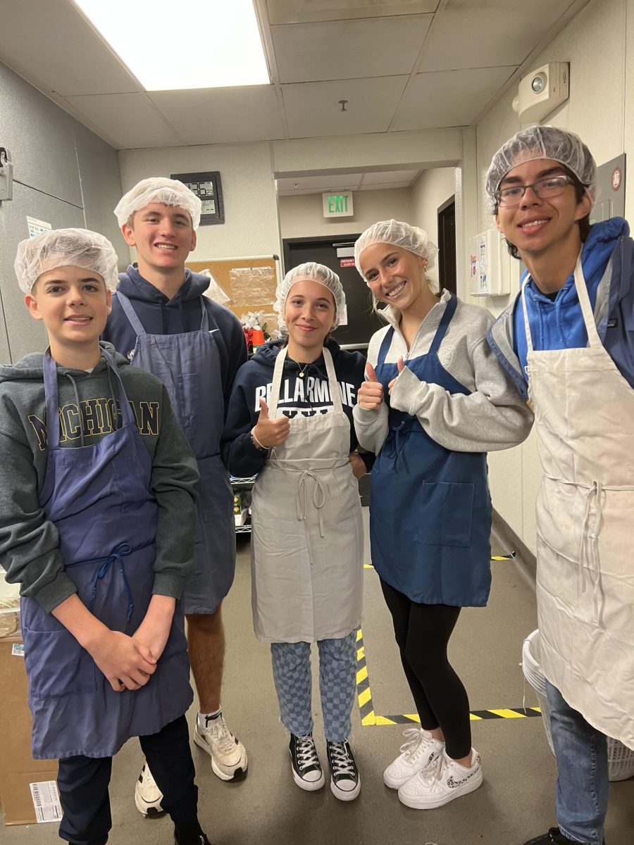Even as sophomores, these now juniors served the community.  The Tacoma Rescue Mission is yet another place to serve. From left: Jack Wall, Max Moloznik, Clara Rosati, Kate Kokich, Kent Hoiden. 