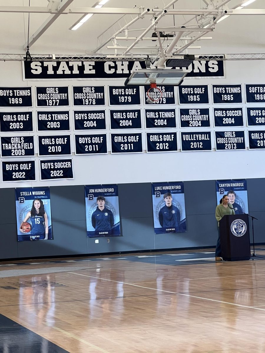 Stella Wiggins shared her story with her basketball photo in the backdrop. 