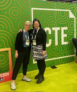 Teachers Melissa Minjares and Brandy Lindstrom pose in front of the National Council of Teachers of English initials at the 2024 convention in Boston, MA. Photo courtesy of Brandy Lindstrom 