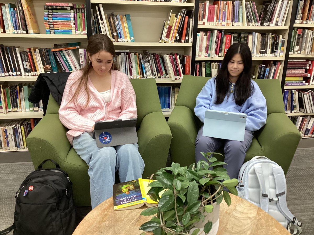 Sophomores Charlotte Hedrick and Caeli Sickelton work quietly in the ACE (Academic Center of Excellence). 
