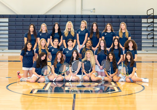 The tennis team players are all smiles. Photo courtesy of Josh_Fernandez